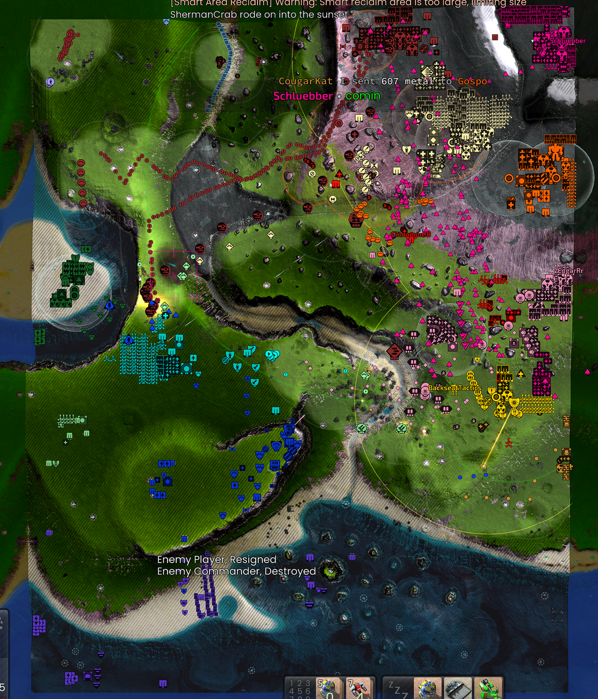 Top-down view of a late-game Pyroclast match, the whole map covered in the colored unit and building icons of both teams